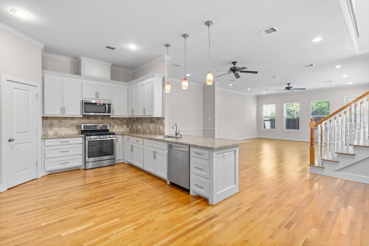 First floor open plan, kitchen, dining are and living room. Comes with half bath, storage and pantry - 1221 W 23rd St