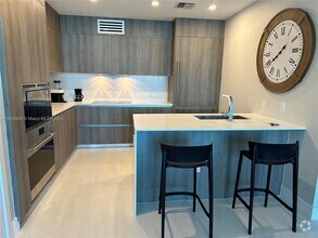 Building Photo - 17550 Collins Ave