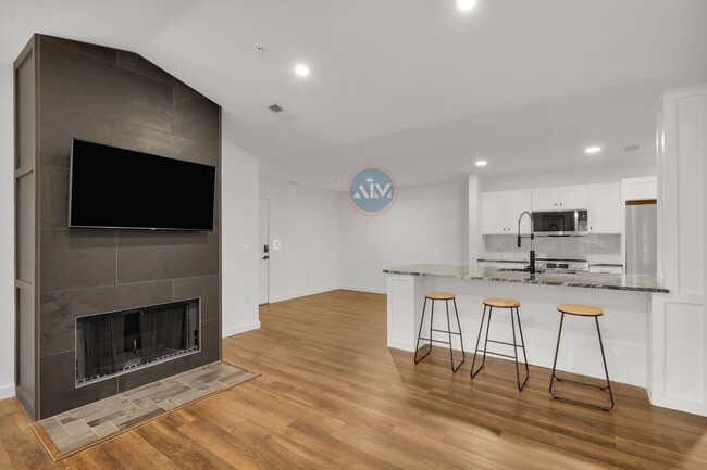 Building Photo - Top-Floor Condo with Modern Upgrades and P...