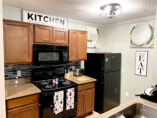 Building Photo - Furnished Resort Style Condo with Lake View