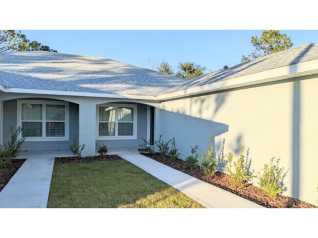 Building Photo - Spacious 4 bedroom/2 bath/ 2 car garage Duplex. www.WeRentSunshine.com