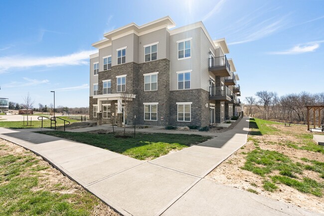 Photo - Spacious 1-Bedroom/1.5-Bath, End/Corner unit 201, available 8/1/26 Apartment