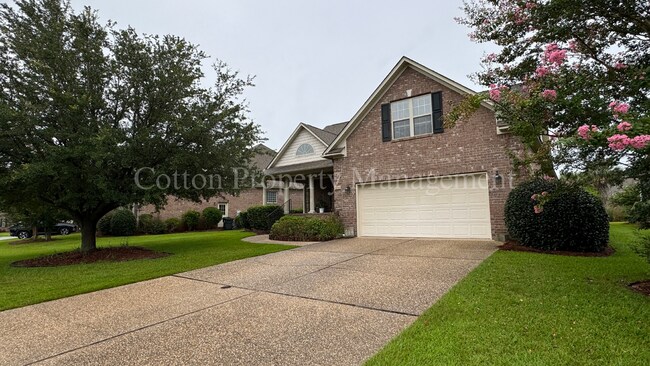 Building Photo - 4BR/3BA Well appointed home in the gated c...