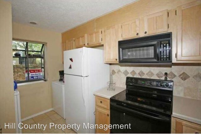 Foto del edificio - 7122 Wood Hollow Dr