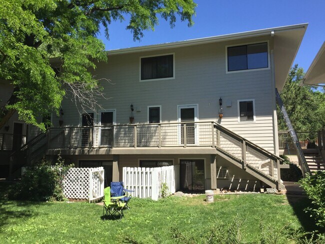 Building Photo - Completely Renovated 2 Bed 1.5 Bath West Pearl Street Condo W/Hiking Trails In Your Backyard.