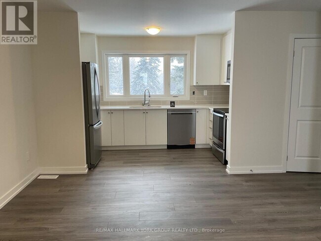 Photo du bâtiment - 124 Squire Dr