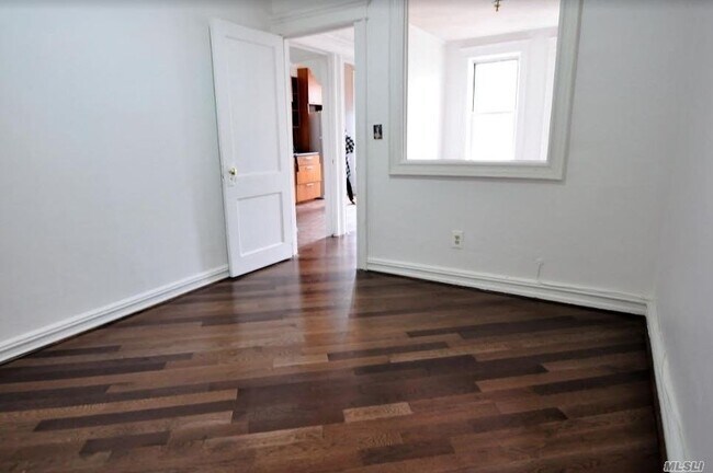 Building Photo - 62-22 60th Dr