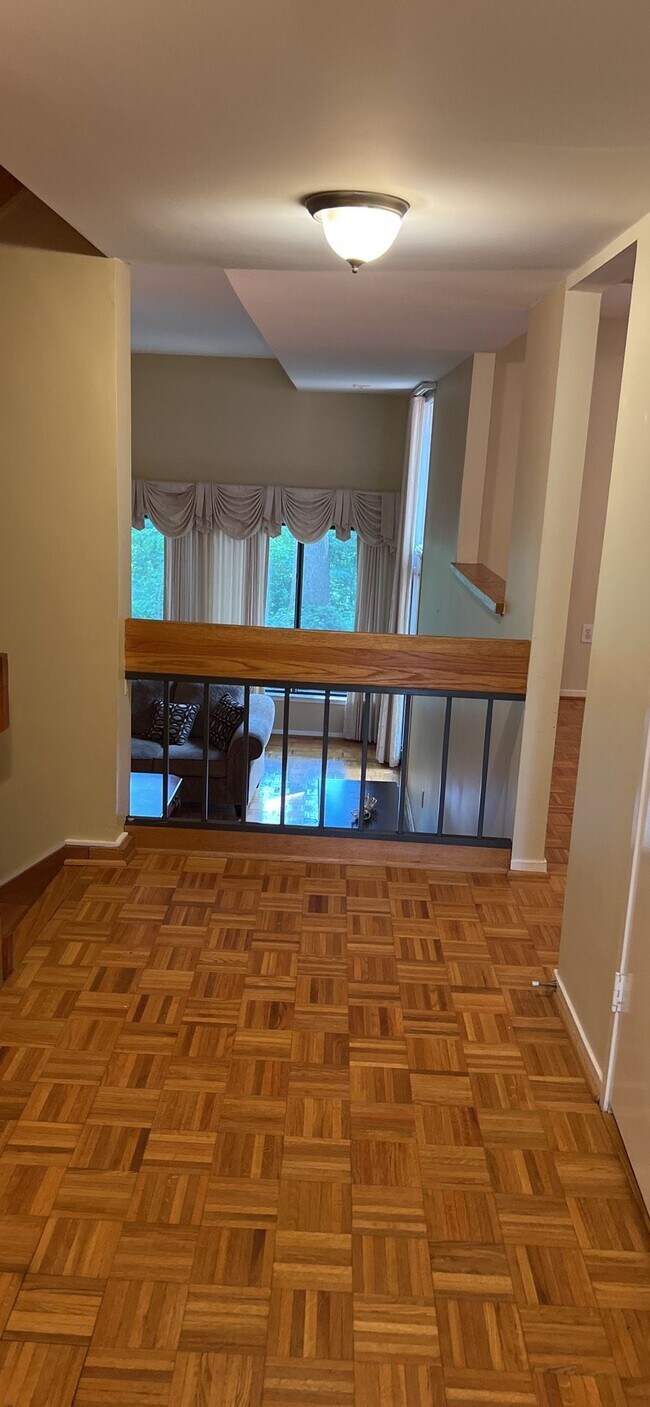 hall overlooking the living room - 11733 Indian Ridge Rd