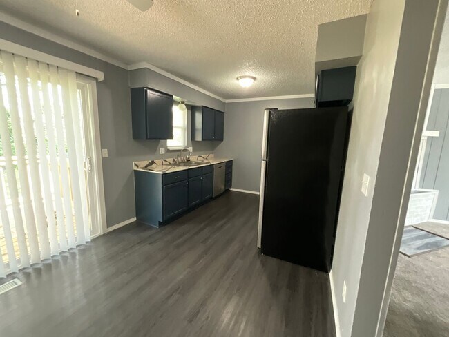 Building Photo - Large 3 bedroom with fenced in yard