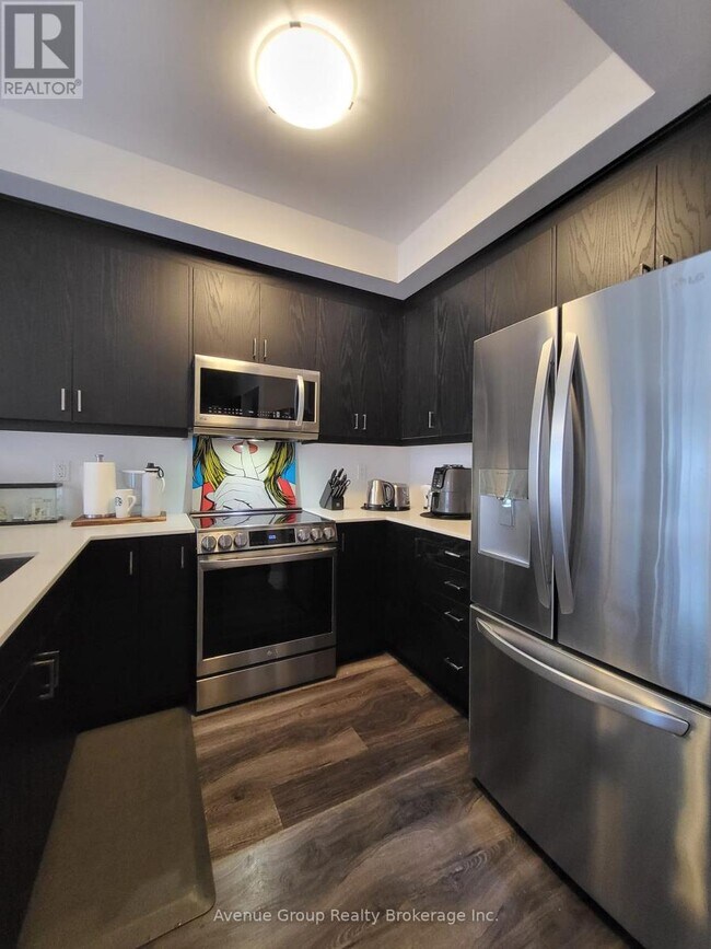 Photo du bâtiment - 575 Woodward Ave