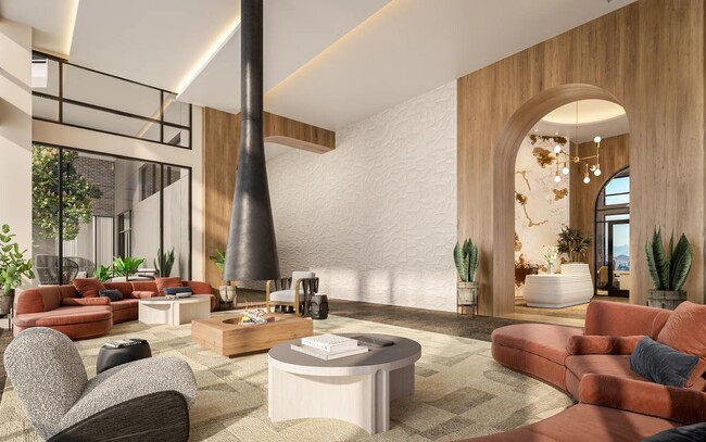 Salón en el vestíbulo inspirado en un hotel con chimenea, asientos cómodos y cafetería. - Modera Reserve