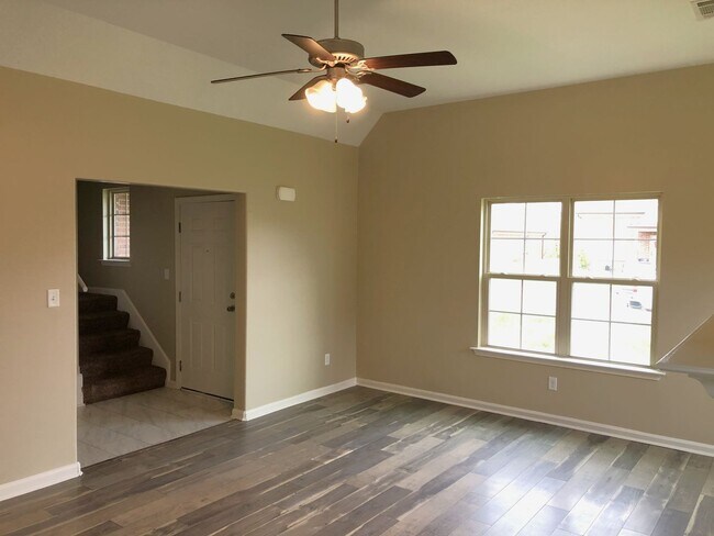 Building Photo - Enjoy Country living with a city feel!