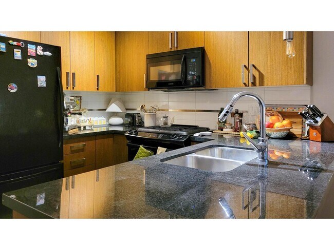 Photo du bâtiment - 15988-15926 26 Ave