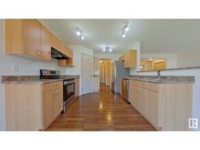 Building Photo - 11712-11713 13 Ave SW