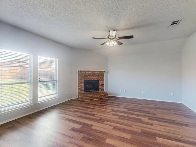 Building Photo - Welcome to this charming single-story 4-be...