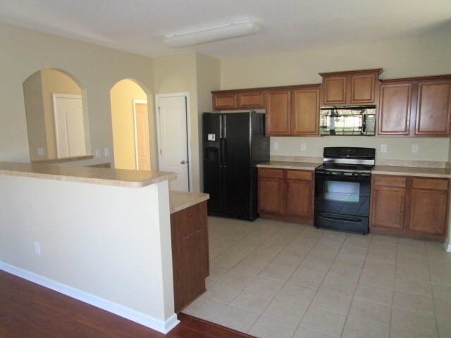 Foto del edificio - 6903 Grand Hickory Dr