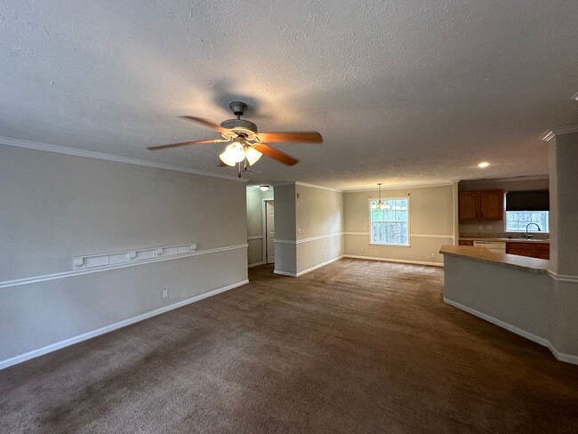 Building Photo - Country setting, lots of yard, and CHECK O...