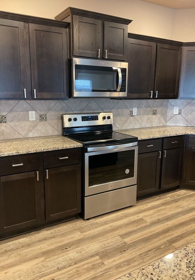 Building Photo - NEW IN MANAGEMENT - AVAILABLE NOW!