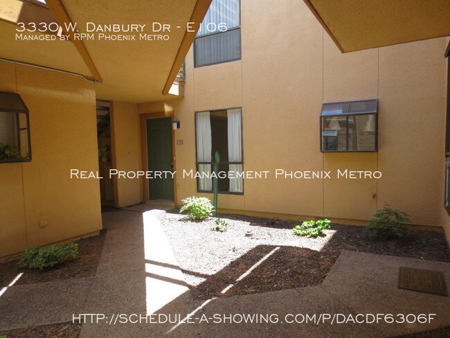 Building Photo - UPDATED GROUND FLOOR CONDO WITH HUGE PATIO!!
