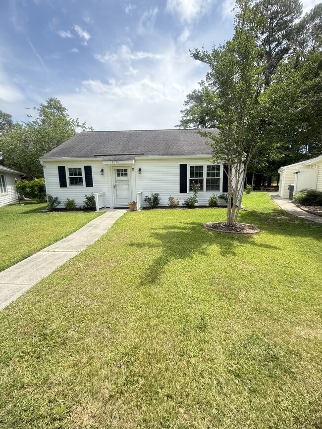 Building Photo - 6576 Pebble Beach Crescent