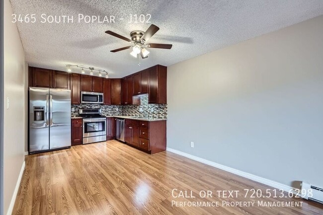 Building Photo - 3465 South Poplar-J102