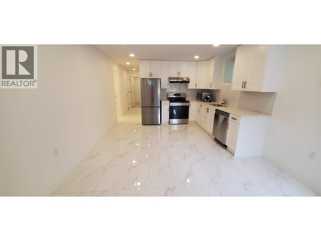 Photo principale - 1XX W 43rd Ave