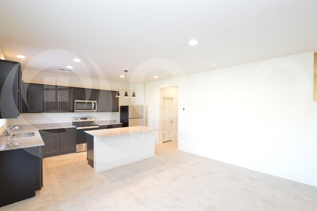 Building Photo - 24588 W Flores Dr