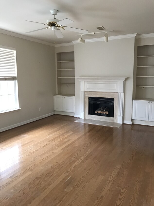 Main living room with gas fireplace. - 7245 HWY 70S