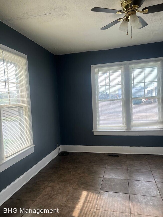 Building Photo - 3 br, 1.5 bath House - 713 E. 5th St.