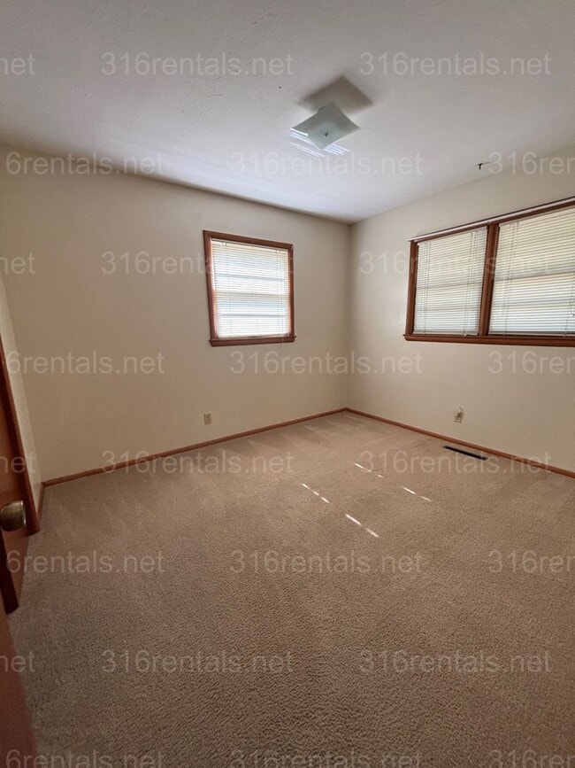 Building Photo - Two bedroom one bath duplex available now!