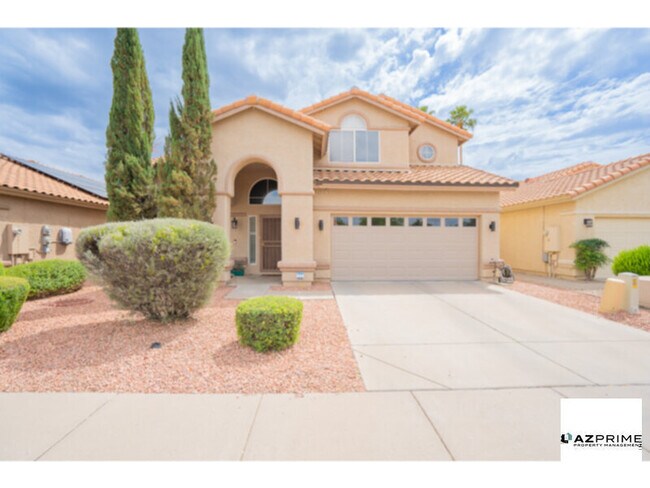 Foto del edificio - This charming and spacious 4/2.5 single family Phoenix house is perfect for comfortable living!