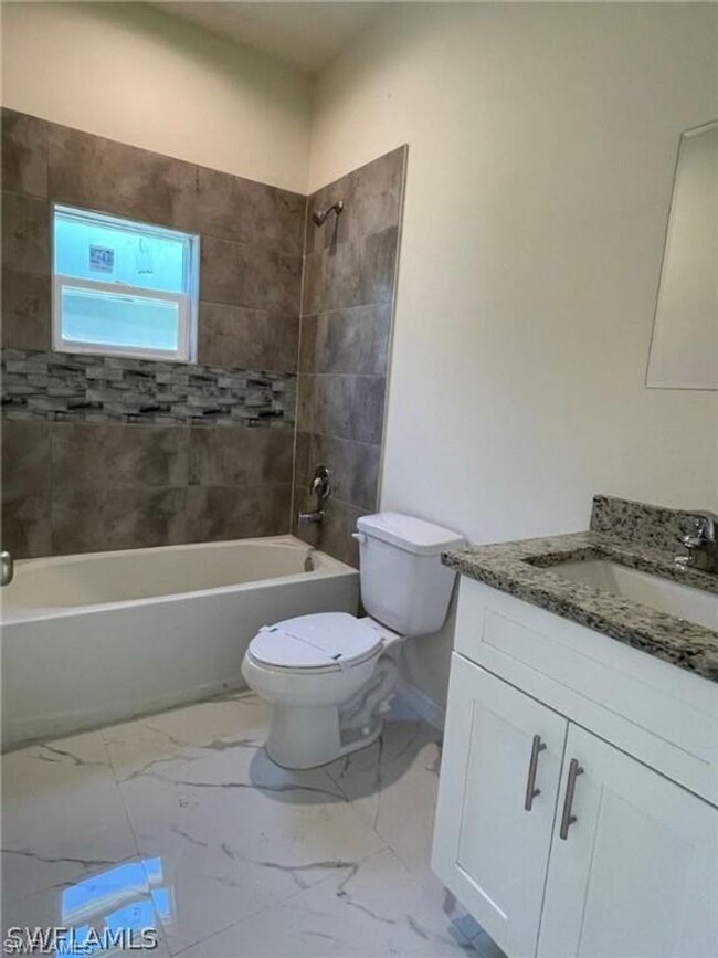 Building Photo - Available Now Three Bedroom 2 bath/ Single...
