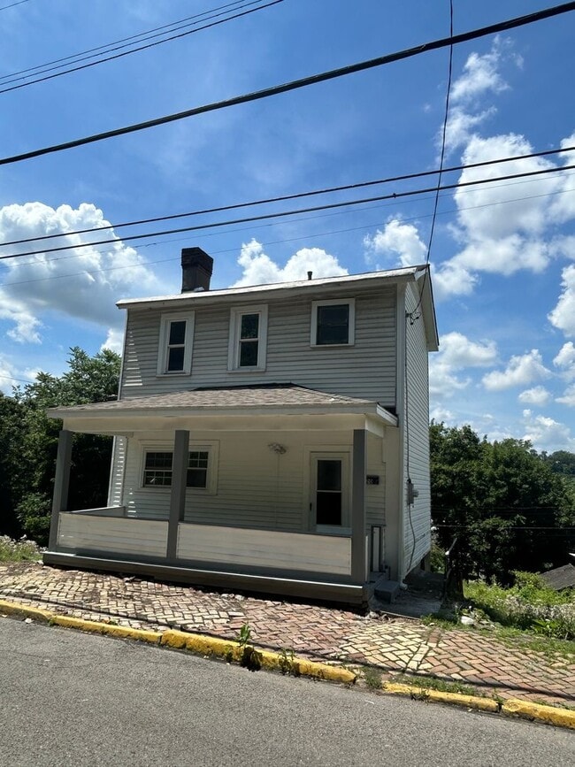 Charming 2-Bedroom Home with Front Porch in McKeesport - Charming 2-Bedroom Home with Front Porch in McKeesport