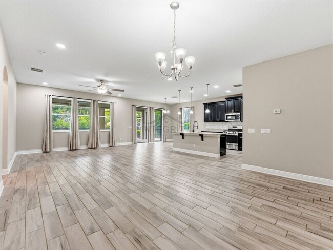 Building Photo - 8947 Garden Party Dr