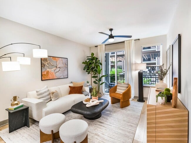 Large windows and open layouts bring warmth and flow to your living space, with thoughtfully selected finishes that complement your style. - Modera Riverview