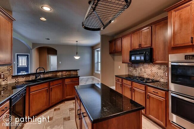 Building Photo - 5 br, 3 bath House - 1609 Teakwood Drive UNIT