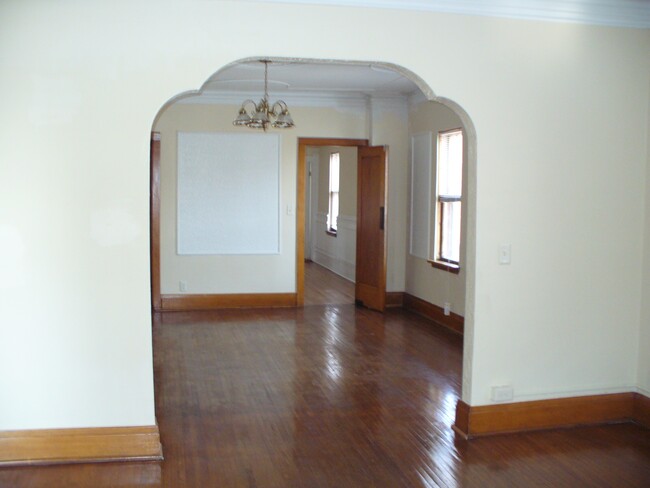 Unit 1 - From East Entrance - Dining room Kitchen Door. - 111 Main Ave W