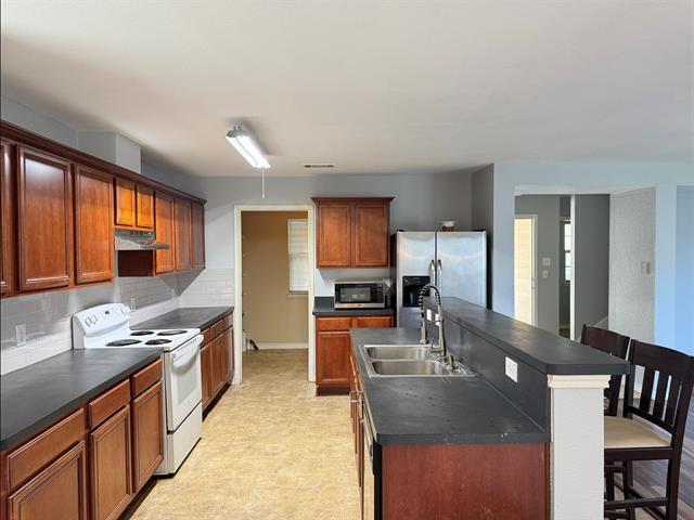 Foto del edificio - 6909 Planters Row Dr