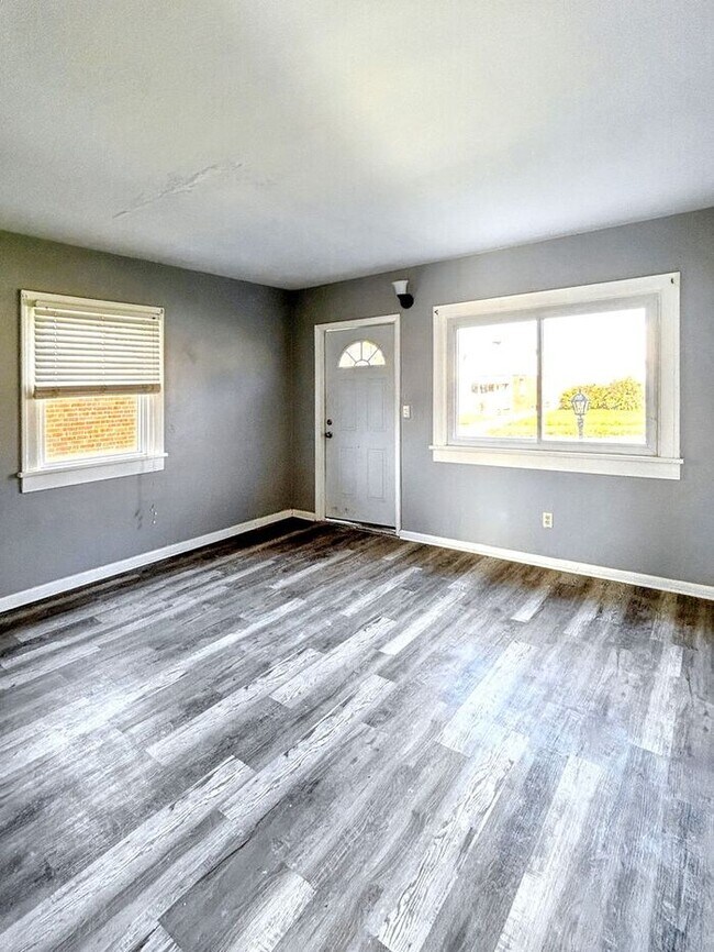 Foto del edificio - Adorable 3-Bedroom Home with Bright, Invit...