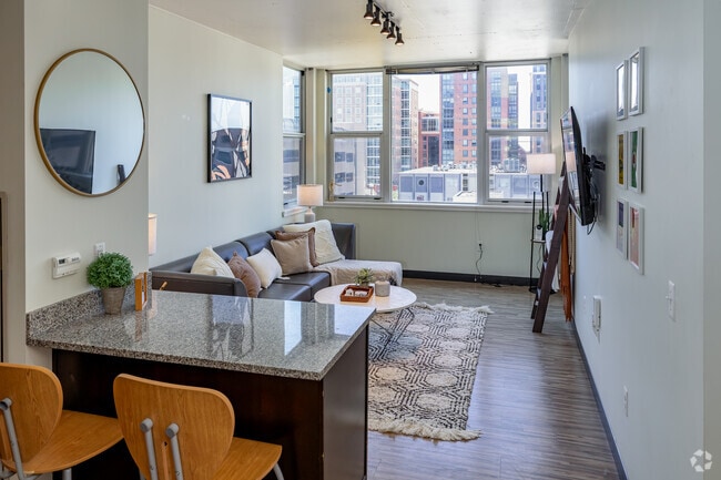 4BR, 2BA - 1,308SF - Model - Living Room - Landmark Apartments