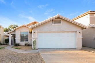 Building Photo - 8667 W Palm Ln