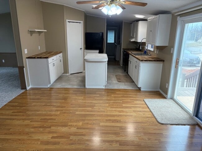 Building Photo - Spacious 4-Bedroom Home Available NOW in Skyway Park Village!