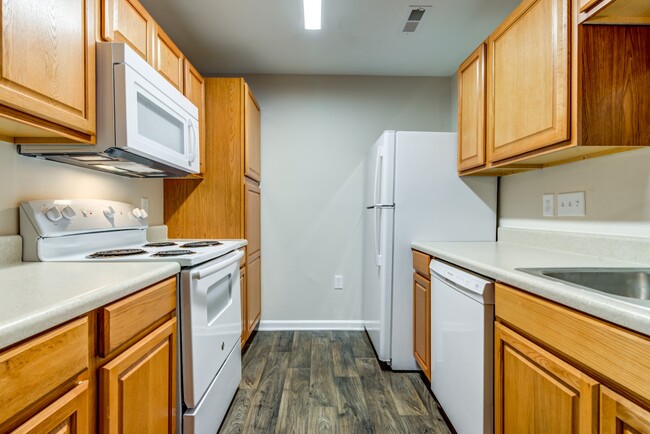 Kitchens complete with convenient appliances - Sharon Oaks Apartments