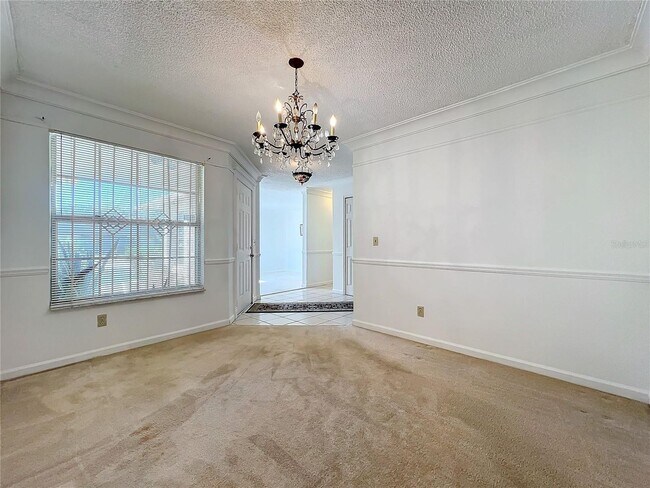 Building Photo - 3 bedroom 2 bath home with solar panels, workshop, large backyard and Florida Room!