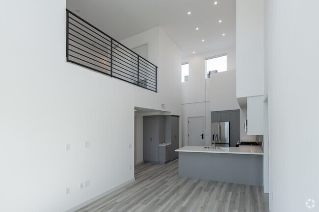 2BR, 2BA - 1,232SF - B1 Loft - Living Room - Aurum