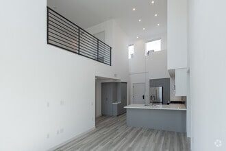 2BR, 2BA - 1,232SF - B1 Loft - Living Room - Aurum