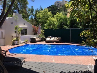 Partial view of yard & pool - 8567 Walnut Dr