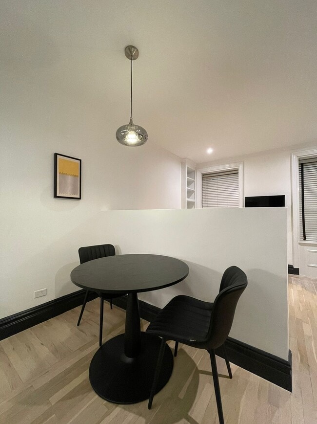 Photo - 115 E 37th St Apartments