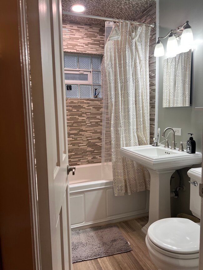 Bathroom with whirlpool tub and shower - 8041 Lake St