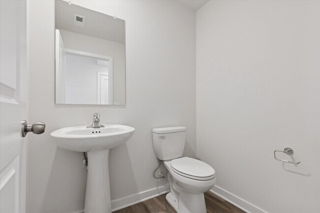 Foto del edificio - COMING SOON! Brand New River Pointe townhome with modern finishes, flexible living space, and a p...